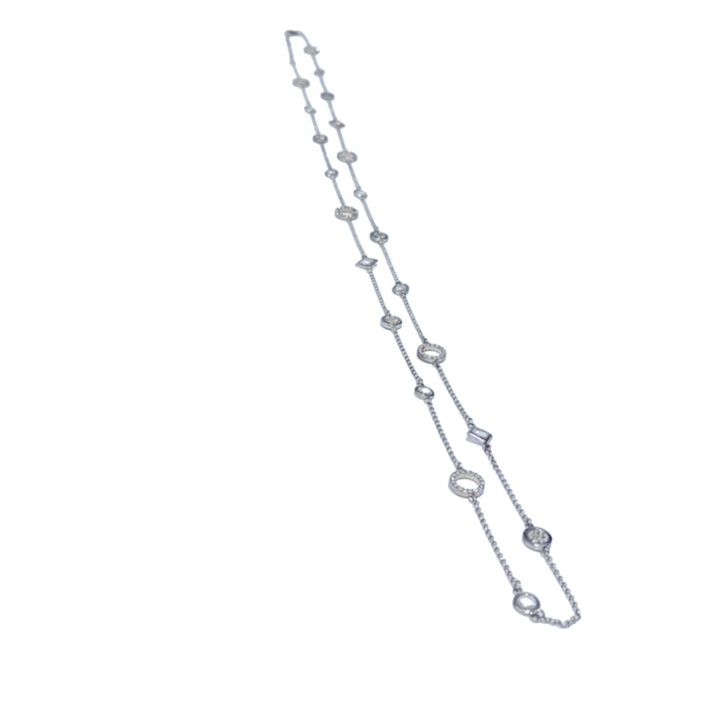Long silver tone Lia Sophia crystal and rhinestone necklace. GUC